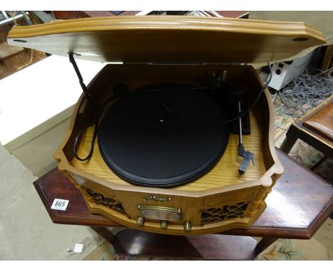 A modern oak cased record player 