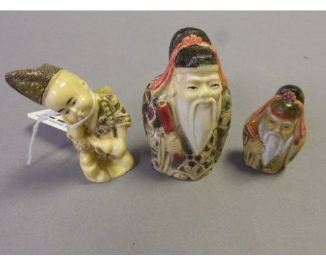 Three netsuke style carvings to include old men and young boy