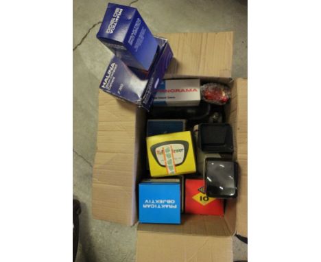 A collection of camera and camera accessories 