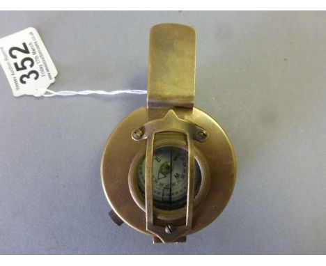 Brass compass stamped TG Co Ltd London 1940 mkIII with crows foot mark
