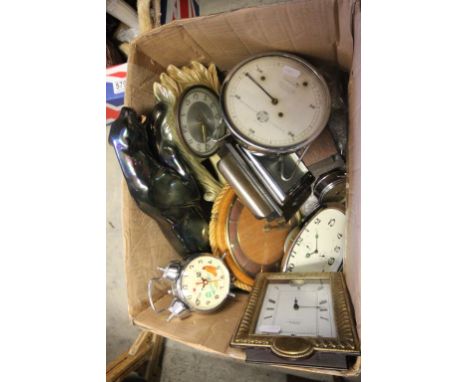 An Art Deco ceramic clock decorated with a panther, along with various other items 