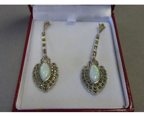 A pair of silver and opal art deco style drop earrings 