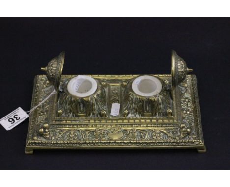 A Victorian double brass inkwell 
