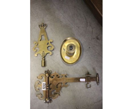 A brass inkwell, along with brass wall bracket and one other item