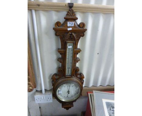 Large ornate wooden barometer