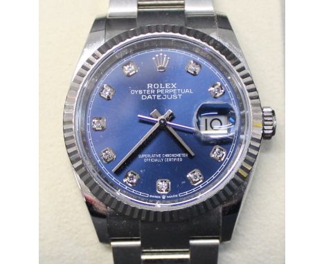 Gents Rolex Oyster Perpetual datejust wristwatch on a stainless steel jubilee bracelet strap with diamond baton numerals and 