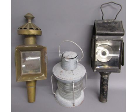 2 carriage lamps and a candle lamp