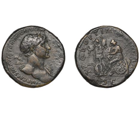 Trajan, Sestertius, 105, laureate bust right, draped over far shoulder, rev. Dacia seated left in attitude of mourning on shi