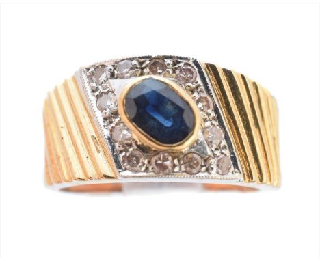 A sapphire and diamond dress ring, the oval shape sapphire within a single cut diamond surround and grooved tapered shoulders