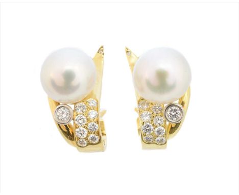 A pair of 18ct gold cultured pearl and diamond earrings by Boodles, each designed as a cultured pearl atop a scrolling vari s