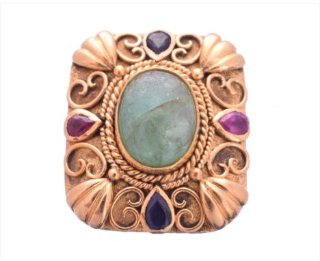 A vari gem dress ring, the oval shape emerald with pear shape ruby and sapphire quatrefoil accents, inset to the convex recta