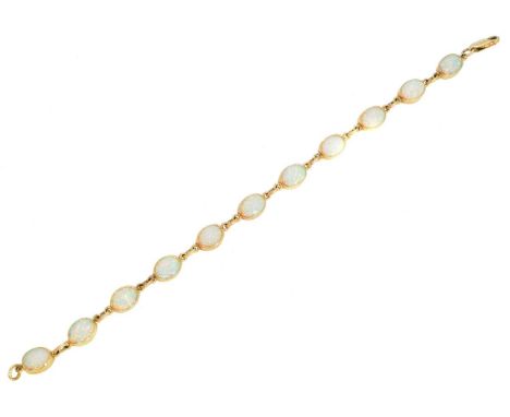 A 9ct gold synthetic opal bracelet, designed as a series of synthetic opal cabochon collets with trace link chain spacers and