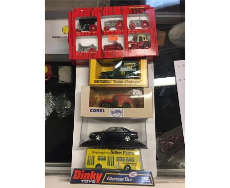 Five assorted make collectable model cars to include: Dinky Atlanean bus, Audi A8, Corgi Ford Popular van with Post Office li