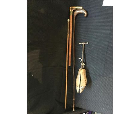 Four collectable items, a swagger stick, walking cane, part hunting crop and a shoe tree.