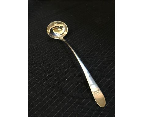 A silver ladle 24 g in weight, indestinct hallmark probably Exeter