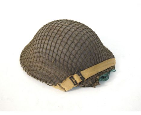WWII PERIOD BRITISH ARMY STEEL HELMET
with liner, webbing chinstrap and net covering