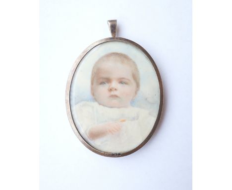 WWI PERIOD HANDPAINTED OVAL PORTRAIT MINIATURE
of a child, on ivory, 5.3cm x 4.3cm, set in a silver pendant/locket mount