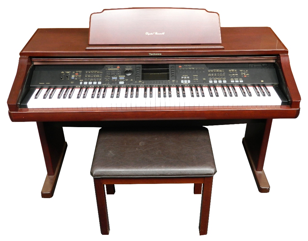 TECHNICS SXPR902 ELECTRIC PIANO with a central LCD screen, slot for