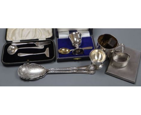 A pair of late Victorian silver serving spoons, Sheffield, 1899 and other small silver including christening mug, christening