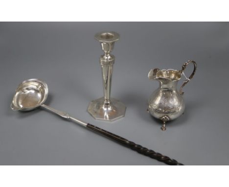 A Victorian engraved silver cream jug, Richards &amp; Brown, London, 1869, a George III silver toddy ladle, London 1807 and a