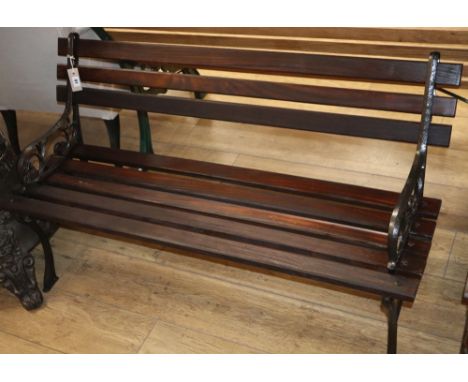A Victorian style black painted cast metal garden bench, W.120cm, D.48cm, H.66cm