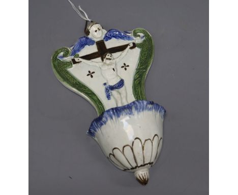 An early 19th century pearlware holy water scoop, length 24cmCONDITION: Some light crazing, there is a chip to the back rim, 