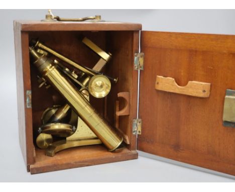 A mahogany cased brass microscope
