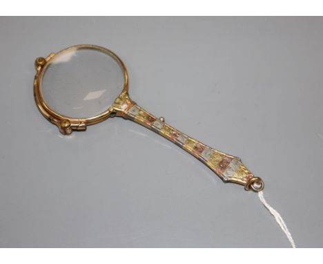 A 14ct three coloured gold plated lorgnette, 11.3cm.CONDITION: Glass ok. Mechanism works. Overall good condition commensurate