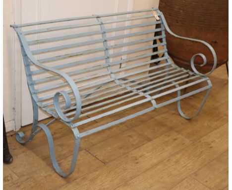 A Victorian painted wrought iron garden bench, W.122cm D.55cm H.74cm