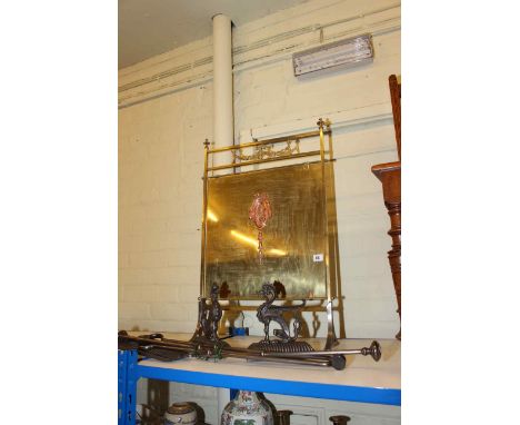 Brass and copper firescreen, pair of cast metal fire dogs and set of three fire irons
