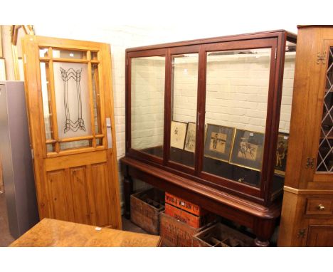 Large mahogany illuminated display cabinet on a turned leg stand, 194cm high by 180cm wide