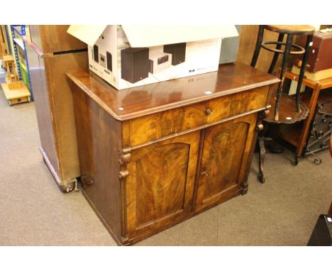 19th Century mahogany cabinet having long drawer above two arched panel doors