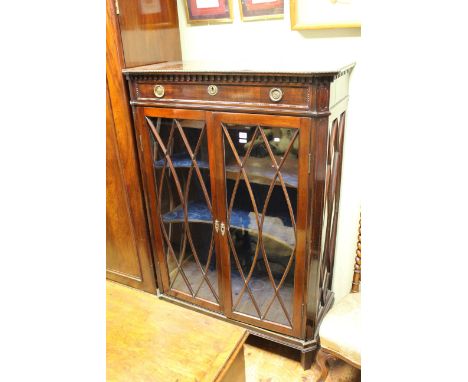 Early 20th Century mahogany china cabinet having long drawer above two glazed panel doors