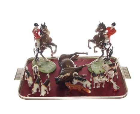 Two Beswick huntsmen, hounds, fox, etc