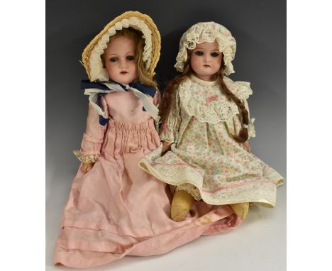Dolls - a German Metzier bisque socket head doll, sleeping blue eyes, open mouth. light brown curly wig, on jointed compositi
