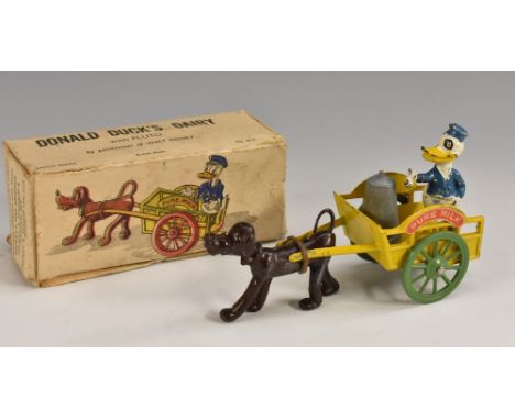 A vintage 1940s Salco series (Charbens) Disney Novelties cast metal model Donald Duck`s Dairy with Pluto, yellow Pure Milk tr