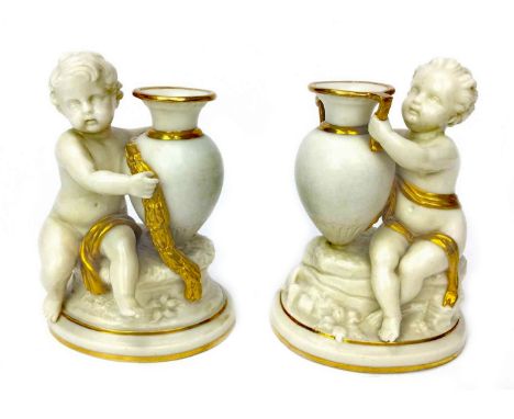 PAIR OF WORCESTER KERR AND BINNS SPILL VASES, both modelled as children with amphora, printed marks to base, 12cm high