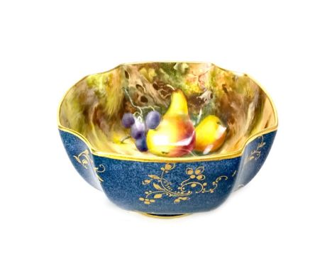 ROYAL WORCESTER HAND PAINTED BOWL BY A. ROBERTS, the interior painted with fruits, the mottled blue exterior with gilt highli