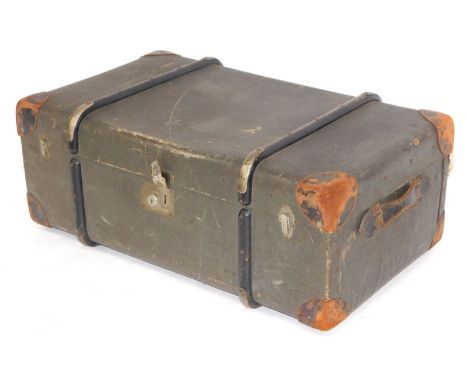 A canvas bound trunk, on a blue painted border with leather straps, 52cm deep, 83cm wide and 30cm high.
