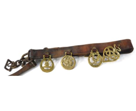 A military leather bridle, with arrow marked R and Mason, Walsall 1946 and four associated brasses comprising Mayflower, wind