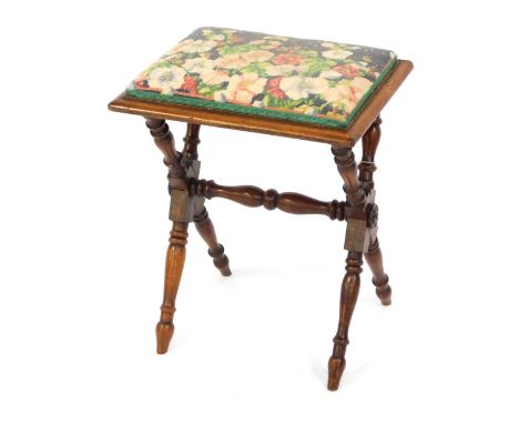 A 19thC walnut stool, the rectangular top with flower tapestry seat, on bobbin turned axe framed base, 51cm high, 41cm wide, 