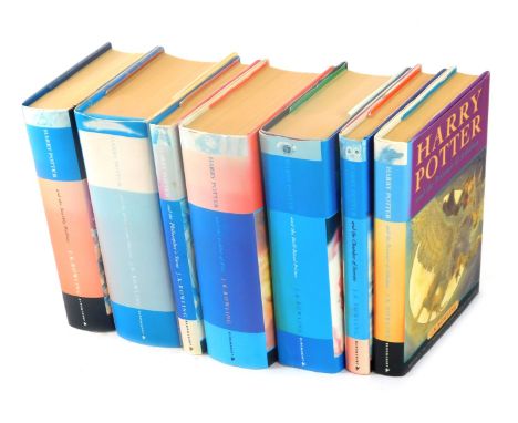 J K Rowling. A set of seven Harry Potter hardback books, comprising Philosophers Stone, The Goblet of Fire, Half Blood Prince