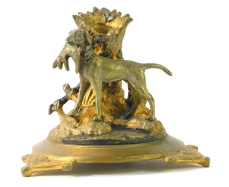 A 19thC gilt metal epergne, formed as a greyhound carrying rabbit, on tripod base, lacking vase, 8cm high.