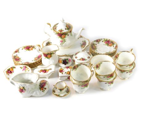 A Royal Albert Old Country Roses part tea service, comprising six cups and saucers, milk jug, sugar bowl, teapot, six side pl