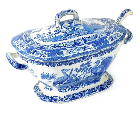 A 19thC blue and white serving tureen and ladle, decorated with Asiatic Pheasants, with later ladle, 29cm high. (AF)