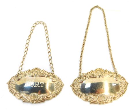 Two Elizabeth II silver decanter labels, each with shell capped and vine border, one plain one inscribed port, Birmingham 200