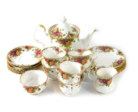 A Royal Albert Old Country Roses part tea service, comprising teapot, six cups and saucers, milk jug, sugar bowl and six side