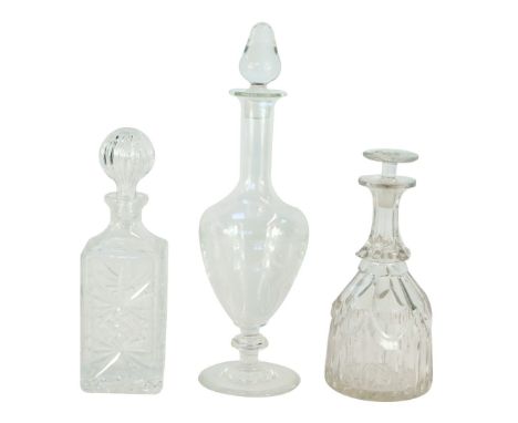 A Continental glass decanter and stopper, engraved with festoons, bears label, 40cm high, together with a Victorian cut glass