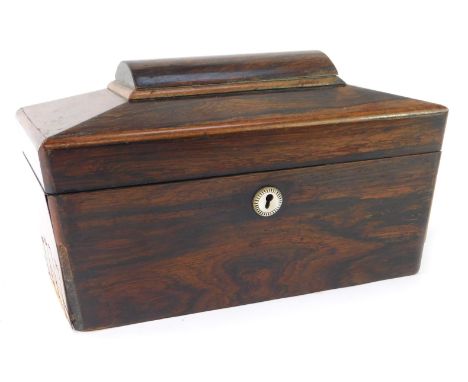 A 19thC rosewood sarcophagus shaped tea caddy, with a domed and canted top, with mother of pearl escutcheon, opening to revea