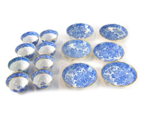 Eight 19thC Spode blue and white tea bowls and saucers, each with a gilt border.